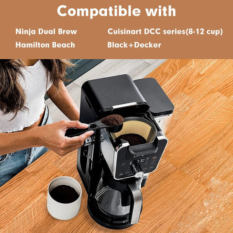 Person adding ground coffee to a Ninja brewer using Permanent Reusable Cone Shape Metal Coffee Filter Fits Ninja CFP301 CFP201
