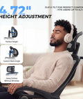 Person sitting on ergonomic office chair with footrest, adjustable headrest, supports up to 6.2 ft users, mesh back design.
