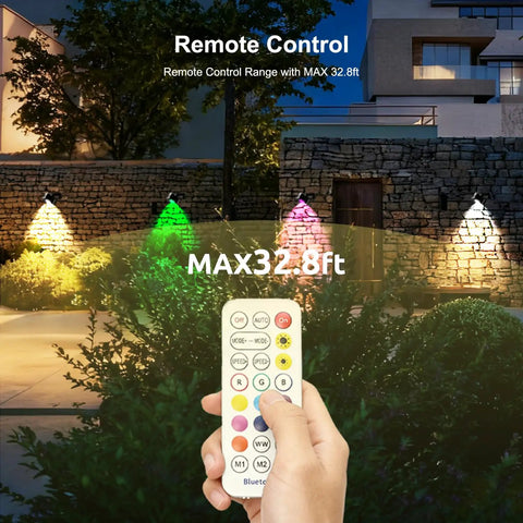 Person using remote control for 8 Pack Smart RGBW Outdoor Landscape Lights With IP65 Waterproof, Low Voltage, 16 Million Colors