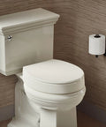Bathroom with Hyten 3 Inch Elevated Soft Close Round Toilet Seat With Contoured Comfort Grip Tight Bumpers Quick Attach Hardware.