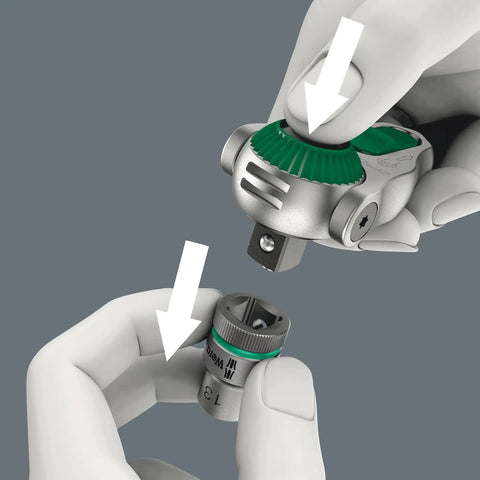 28 Piece 1/4 Inch SAE Ratchet Set With Wera Zyklop Speed, shown with hands demonstrating quick release mechanism.