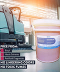 Kick Ass Heavy Duty Low Foam Auto Floor Cleaner Industrial Strength Concentrate 5-gallon bucket on floor with cleaning machine.