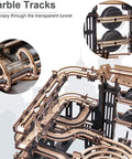 Close-up of 3D Wooden Marble Run Puzzle Kit for Adults showing mechanical tracks and clear tunnels, night city themed.