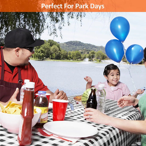 Family enjoying picnic on table with Six Foot Picnic Table And Bench Cover Set Waterproof Windproof Elastic Tablecloth Fits 72 By 30 Inches Tables And 12 By 72 Inches Benches Three Pack With Table Cover And Bench Covers Black White Checkered Outdoor Camping Gear