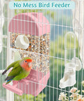 No Fuss Automatic Bird Feeder With Spill Proof Bottom Tray Keeps Your Cage Fresh While Dishing Out Crisp Seeds And Clean Water For Parrots Finches Budgies Canaries Sleek Translucent Pink Cage Staple with seed holder and water dispenser.