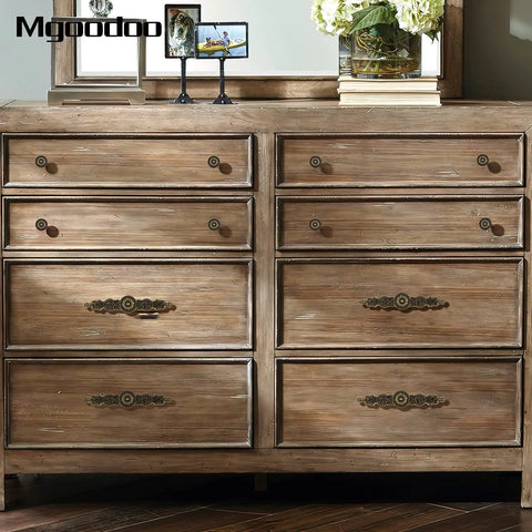 Wooden dresser with vintage cabinet pulls in antique bronze showcasing 3.7 inch hole spacing, ideal for kitchen cabinets and closets.