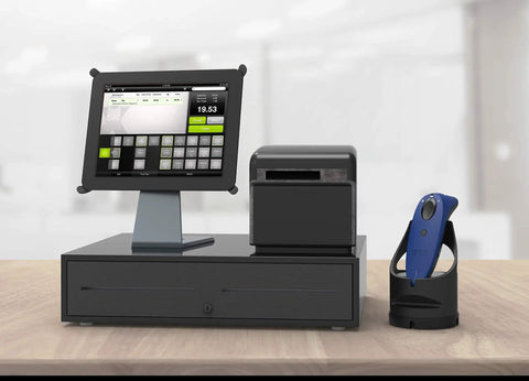 POS setup with tablet, receipt printer, and USB Powered Charging Dock For 600 And 700 Series Scanners on a desk