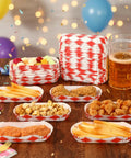 Bulk 300 Piece 6 Inch Disposable Paper Hot Dog Trays Featuring A Red Diamond Grid Layout Grease Resistant Serving Plates For Backyard Cookouts And Weekend Kickbacks with assorted foods.