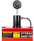 Precision pressure gauge atop Badass 30 Ton Hydraulic Shop Press H Frame Garage Floor Air Powered Press with red base.