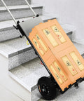 Sturdy Electric Stair Climbing Cart With Heavy Duty Handle For Moving Furniture And Appliances Fast Folding Design on stairs with wooden crate.