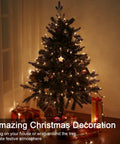 Clear Christmas Lights String With Brown Wire 21 Feet Long 100 Incandescent Bulbs Warm White Glow on a decorated tree indoors