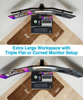 Avlt Electric Standing Desk Converter Fits Triple 32 Inch Monitors view from above showing large workspace with keyboard and monitors.