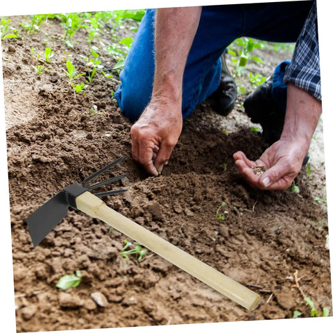 Gardener using Ergonomic Wooden Handle Weeding Hoe And Hand Rake Tool For Weed Control In Your Garden, Lightweight Metal Cultivator.