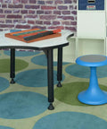 Glow 15 Inch Blue Stool For Classrooms And Playrooms With Convex Base Kid Friendly Circle Time Seating next to activity table