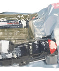 North American Rescue IPOK first aid kit with CAT tourniquet, gauze, and gloves in clear pouch