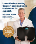 Feel The Ultimate Comfort With This Doctor Approved Memory Foam Seat Cushion Designed For Office Chairs And Cars To Crush Tailbone Pain And Sciatica Suffering While Boosting Your Posture During Those Long Grind Sessions In Style Black, held by Dr. Mark Avart.