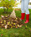 Person using Lightweight Bamboo Rake With Wooden Handle For Leaves And Lawn, 23.4 Inch Hand Rake for soil loosening and weeding