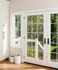 Black 4-inch ball bearing door hinges on white French patio doors; suitable for interior and exterior use.