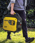 Person carrying Lightweight 4000 Watt RV Ready Portable Inverter Generator With Quiet Tech For Camping, black and yellow design.