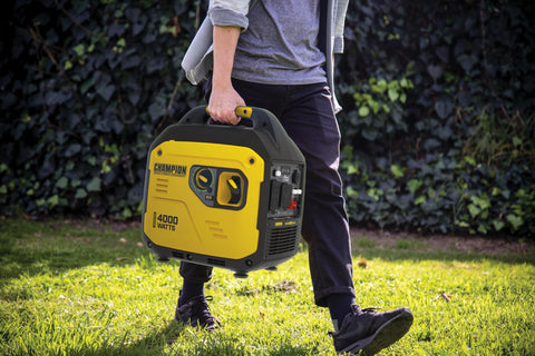 Person carrying Lightweight 4000 Watt RV Ready Portable Inverter Generator With Quiet Tech For Camping, black and yellow design.