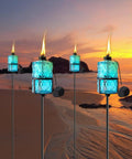Four Pack Blue Glass Garden Torches 12 Oz Citronella Outdoor Lights 60 Inch Adjustable Height 3 Prong Grounded Stakes