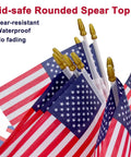 Close-up of 12 Pack Small American Flags 4x6 Inch Hand Held Stick Flags With Safety Spear Top, showing durable and kid-safe spear tops.