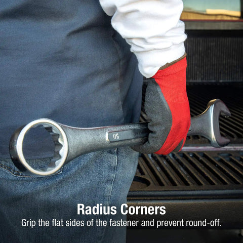 Person holding a 50mm wrench from Jumbo Metric Combination Wrench Set With Roll Case 7 Piece Chrome Plated Beefy Tools, radius corners visible.
