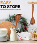 Pro Grade Teak Wood Cooking Spoons Set With Heavy Grip, on kitchen counter with bowls, jug, and wreath