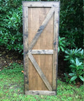 Space Saving Rustic Wood Mountains Sliding Barn Door For Home, 34 x 82 inch, classic farmhouse style against greenery