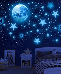 Glow In The Dark Star And Moon Stickers Kit With 1120 Pieces For Ceiling Decor in a child's room creating a night sky vibe