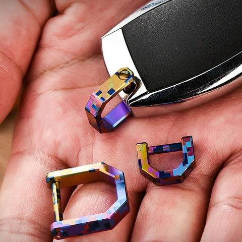 Miniature Keychain Clip With Detachable Tool Precision Alloy Build Dope Color Options in hand close-up