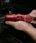 Close-up of hands using Versatile Manual Wrench And Screwdriver Set For Firearms And Bikes 28 Piece Tool Kit on firearm.
