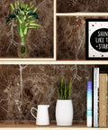 Bookshelf with Coffee Marble countertop contact paper and decor, including vase and books, ideal for renter-friendly DIY makeover.