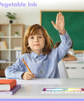 Child in classroom using 40 Pack Waterproof Desk Name Plates With Alphabet And Number Line 1-30 Traditional Manuscript Style