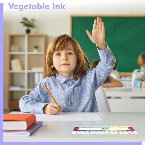Child in classroom using 40 Pack Waterproof Desk Name Plates With Alphabet And Number Line 1-30 Traditional Manuscript Style