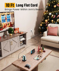 Power Strip Tower Surge Protector With 9 Outlets And 4 USB Ports, 10 Ft Extension Cord in a living room with holiday decor.