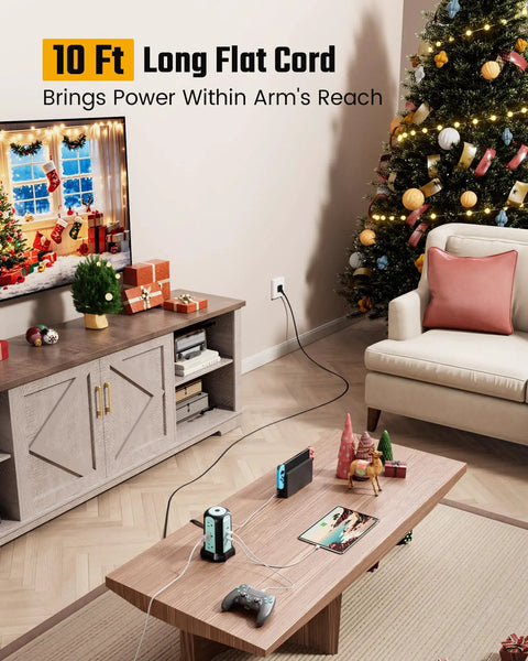 Power Strip Tower Surge Protector With 9 Outlets And 4 USB Ports, 10 Ft Extension Cord in a living room with holiday decor.