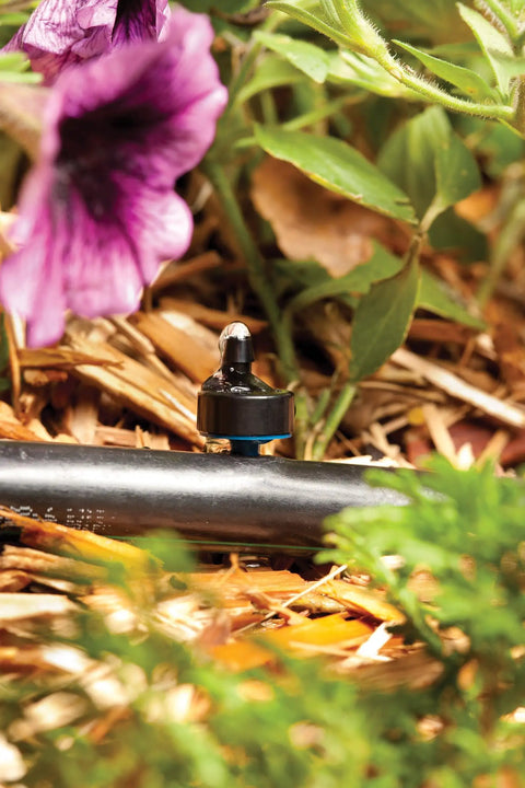 Low Flow 0.5 GPH Button Dripper Emitter for Drip Irrigation, 25 Pack, Self-Piercing Insertion Into 1/4 Inch Tubing in garden setup