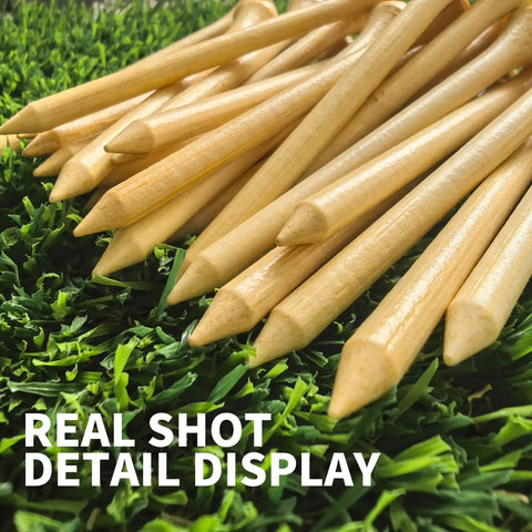 Real shot of Personalized Bamboo Golf Tees Set From 100 To 1000 Pieces, natural bamboo tees displayed on grass