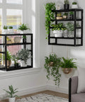 Over The Toilet Towel Rack And Bamboo Floating Shelf Adjustable Height Wall Mounted Dope Space Saving Bathroom Storage For Small Spaces And Kitchens Black Multi Use Organizer styled with plants near a window.