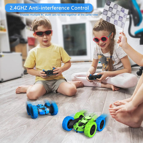 Children playing with Aqua Racer Remote Control Car for Kids, 360 Degree Double Sided RC Vehicle with LED headlights on wooden floor