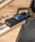 Pocket Hole Jig Micro For Thin Stock And Cabinets For Thirty Three Percent Smaller Micro Pocket Holes In One Half And Three Quarter Thick Materials For Strong Joints On Drawers Repairs And Quick Woodworking Projects in use on a workbench with a drill and wood.