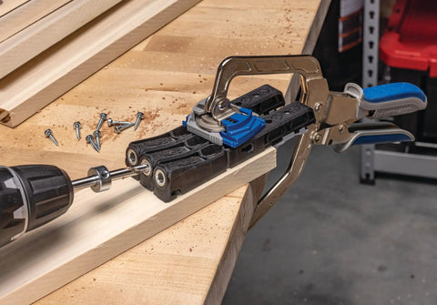 Pocket Hole Jig Micro For Thin Stock And Cabinets For Thirty Three Percent Smaller Micro Pocket Holes In One Half And Three Quarter Thick Materials For Strong Joints On Drawers Repairs And Quick Woodworking Projects in use on a workbench with a drill and wood.