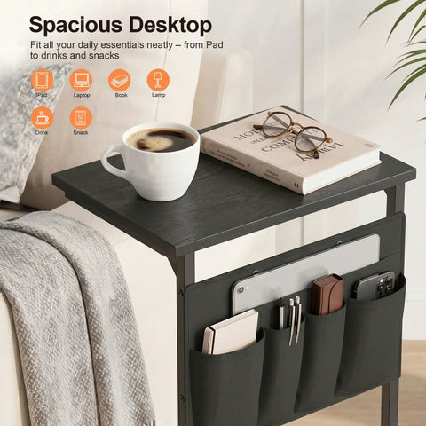 C Shaped End Table With Sliding Tray Under Sofa 28 Inch High Side Table With Storage Bag Black in living room setting
