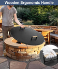 Person placing Round 38 Inch Fire Pit Lid Cover With Wooden Handles For Patio Fire Pits on stone fire pit