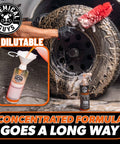 Orange Degreaser Spray For Engines And More Heavy Duty All Purpose Cleaner Pro Strength Breaks Down Grease Oil And Grime For A Deep Clean Of Engines Tires Undercarriages And Tools 16 Oz bottle near scrubbed tire, cleaning process visible.