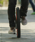 Rider on Lunicycle Seatless Standing Unicycle With New And Improved Design Easy To Learn And Ride Smooth One Wheel Balance Innovative Invention