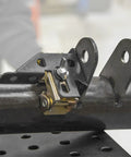 Adjustable magnetic tab holder, close-up on pipe for tack-welding