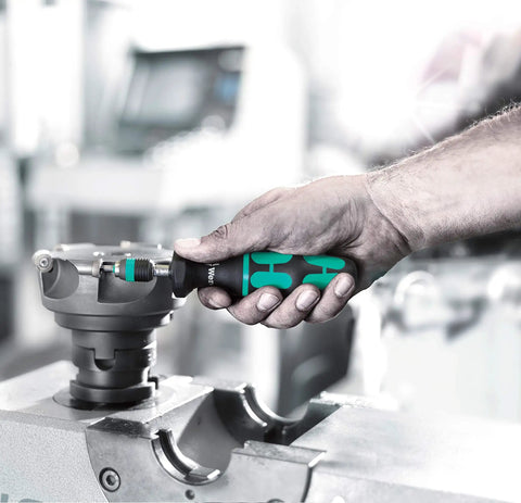 Person using Kraftform Torque Screwdriver Set With Rapidaptor Bitholder, 0.3-6.0 Nm, 27 Pieces, Adjustable Torque for precision work