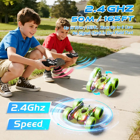 Two boys playing with 4WD Remote Control Car With 360 Flip And Double Sided Stunt Play All Terrain Off Road Toy With LED Light Bar